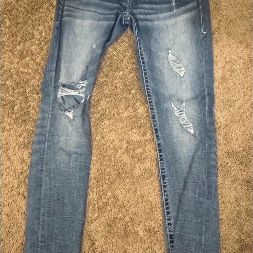 Buckle Distressed Skinny Blue Jeans